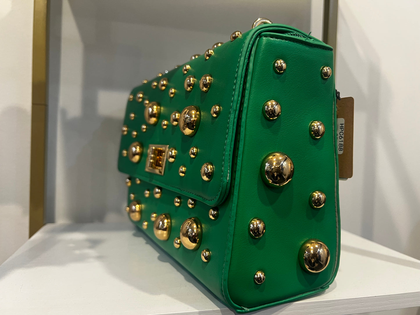 Green studded handbag